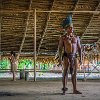 The shaman's son welcomed us and began the short celebration. O filho do pajé nos recebeu e começou a pequena cerimônia. : Amazonas, Brazil, Manaus