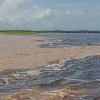 The Solimões is the river with muddy waters, and Negro is the dark one. O Solimões é o rio com as águas barrentas. O Negro é o rio escuro. : Amazonas, Brazil, Manaus