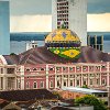 Teatro Amazonas as seen from the balcony of our room at the Hotel Saint Paul. The dome is covered with 36,000 decorated ceramic tiles painted in the colors of the Brazilian flag. O Teatro Amazonas visto da sacada do nosso quarto no Hotel Saint Paul. A cúpula está coberta com 36.000 ladrilhos nas cores da bandeira nacional. : Amazonas, Brazil, Manaus, Opera House, Teatro Amazonas